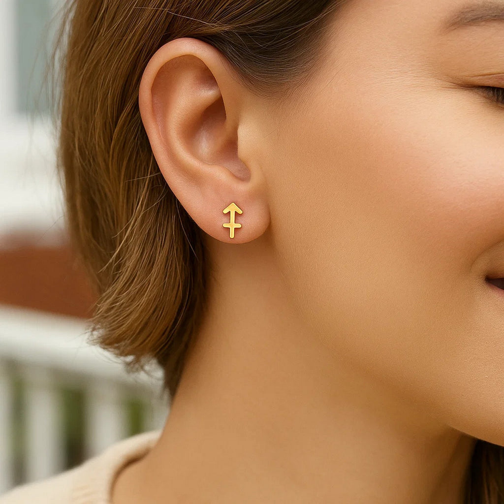 Elegant 14k yellow gold Sagittarius stud earrings showcasing a refined design perfect for any luxury occasion.