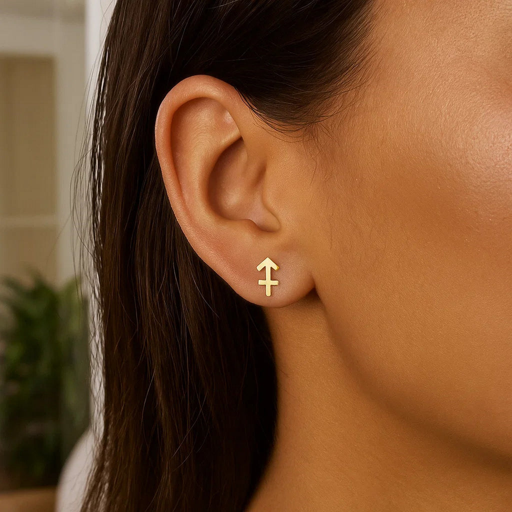 Elegant 14k yellow gold Sagittarius stud earrings featuring a refined design, perfect for sophisticated occasions.