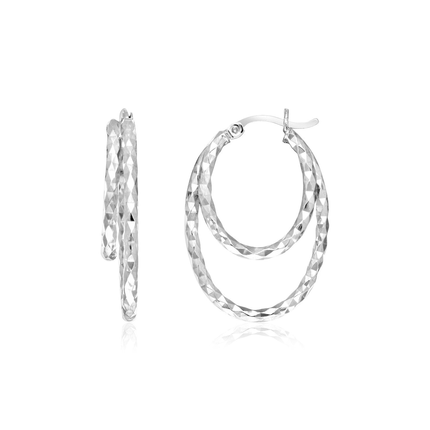 Sterling silver textured double oval hoop earrings, showcasing modern elegance and refined craftsmanship.
