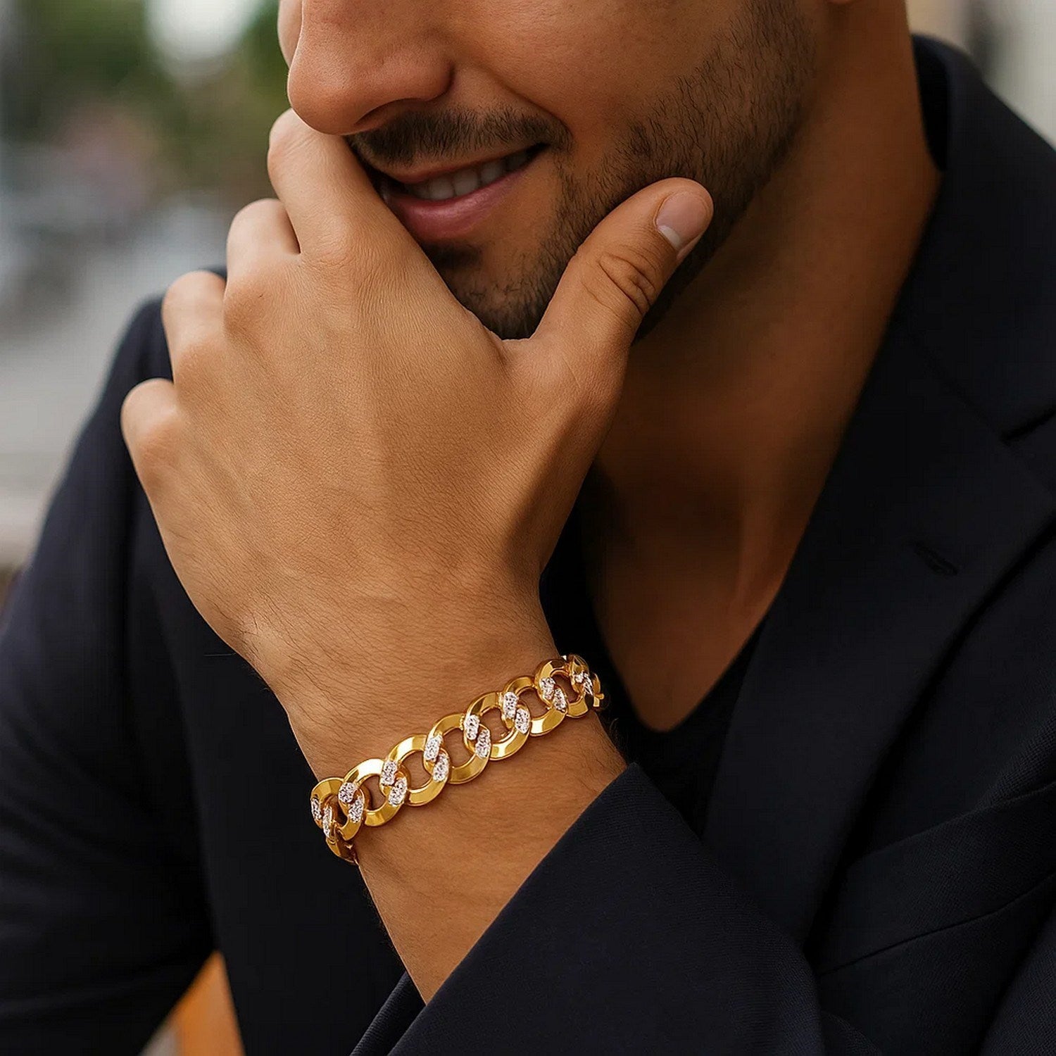 14k two-tone gold pave curb bracelet featuring a modern design with exquisite chain links and stud accents.