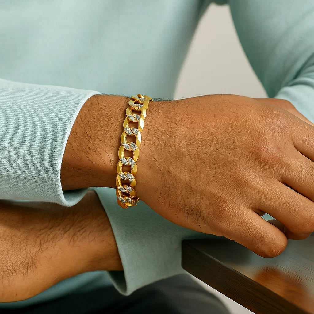 14k two-tone gold pave curb bracelet featuring a modern design with a luxurious chain and stud accents.