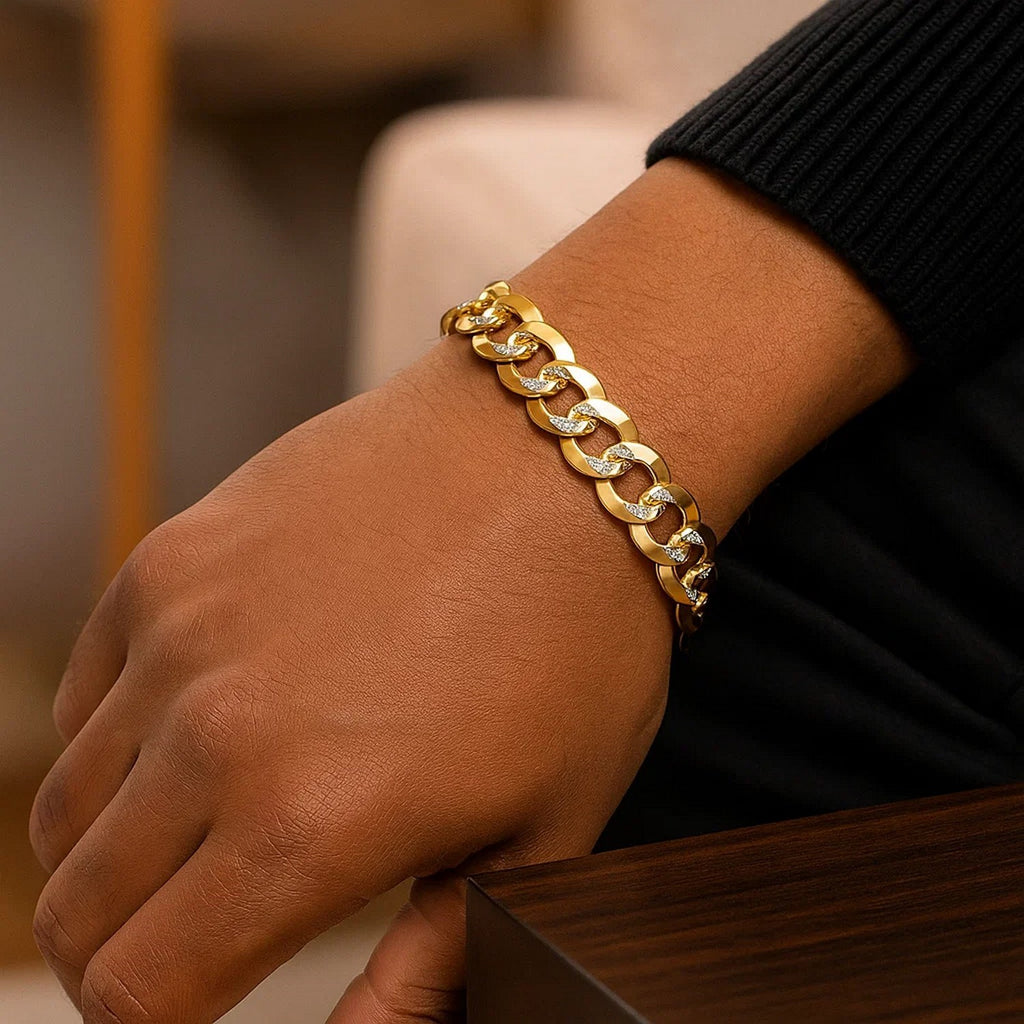 14k two-tone gold pave curb bracelet featuring a modern design with a sleek chain and stud detailing.