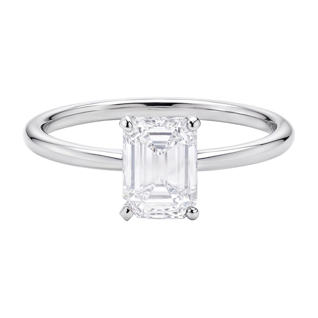 1 carat emerald lab-grown diamond solitaire ring in 10K white gold, featuring a classic prong setting.