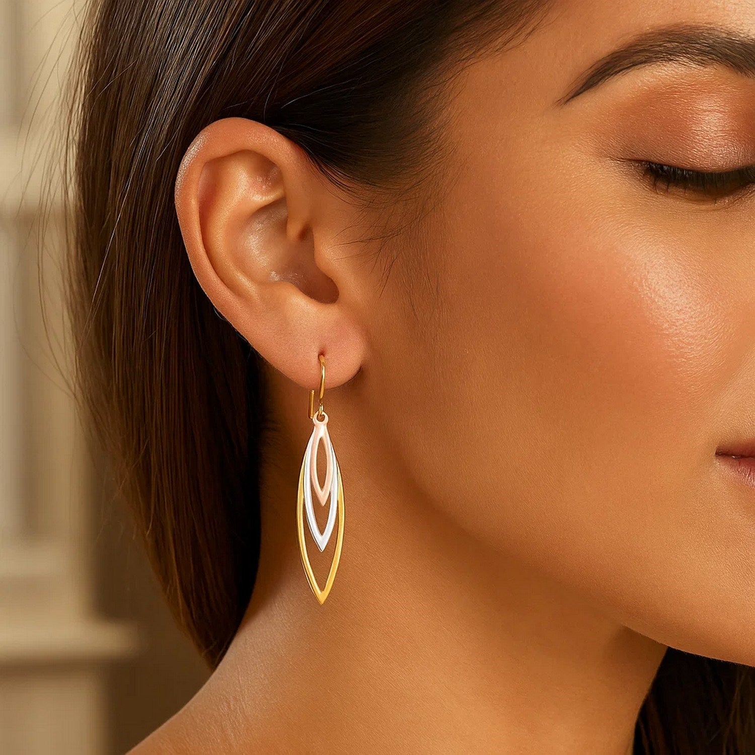 10k tri-tone gold graduated open marquise dangle earrings with modern design and elegant movement.