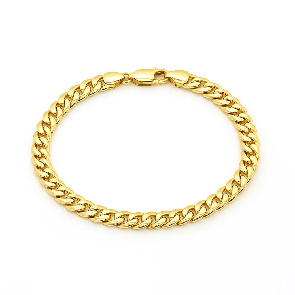 14k yellow gold Miami Cuban semi-solid bracelet with modern link design, showcasing luxurious craftsmanship and style.