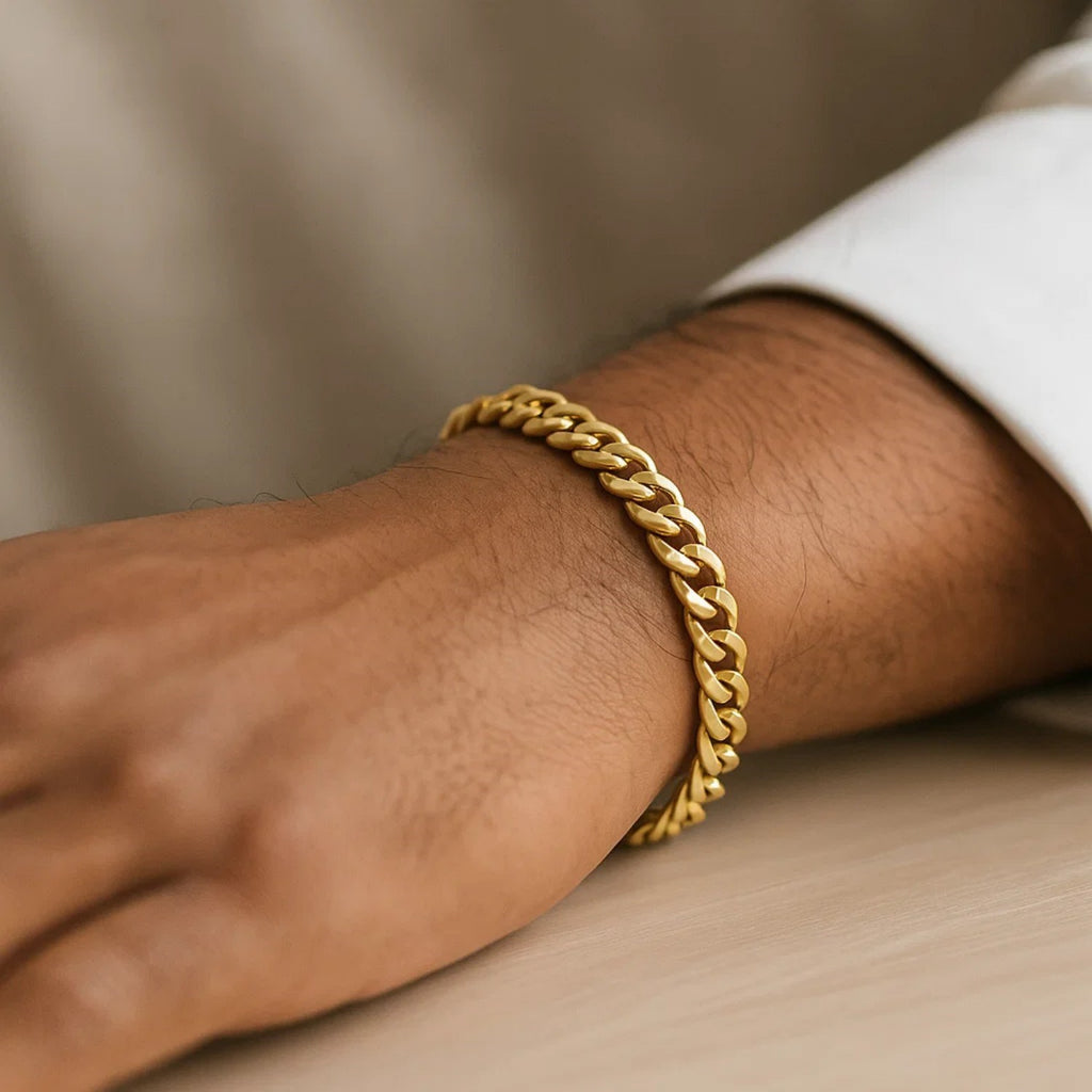 14k yellow gold Miami Cuban bracelet, 7.00 mm, featuring a modern link design for a luxurious statement.