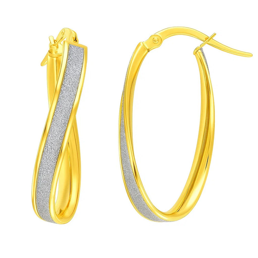 14k two-tone gold glittery oval hoop earrings, showcasing a modern design with a luxurious finish.