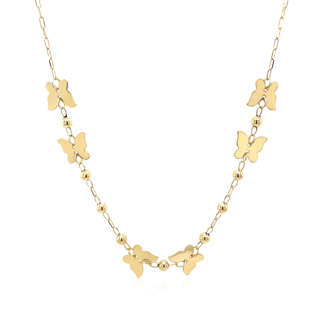 14k yellow gold necklace featuring polished butterflies and beads, showcasing contemporary luxury design.