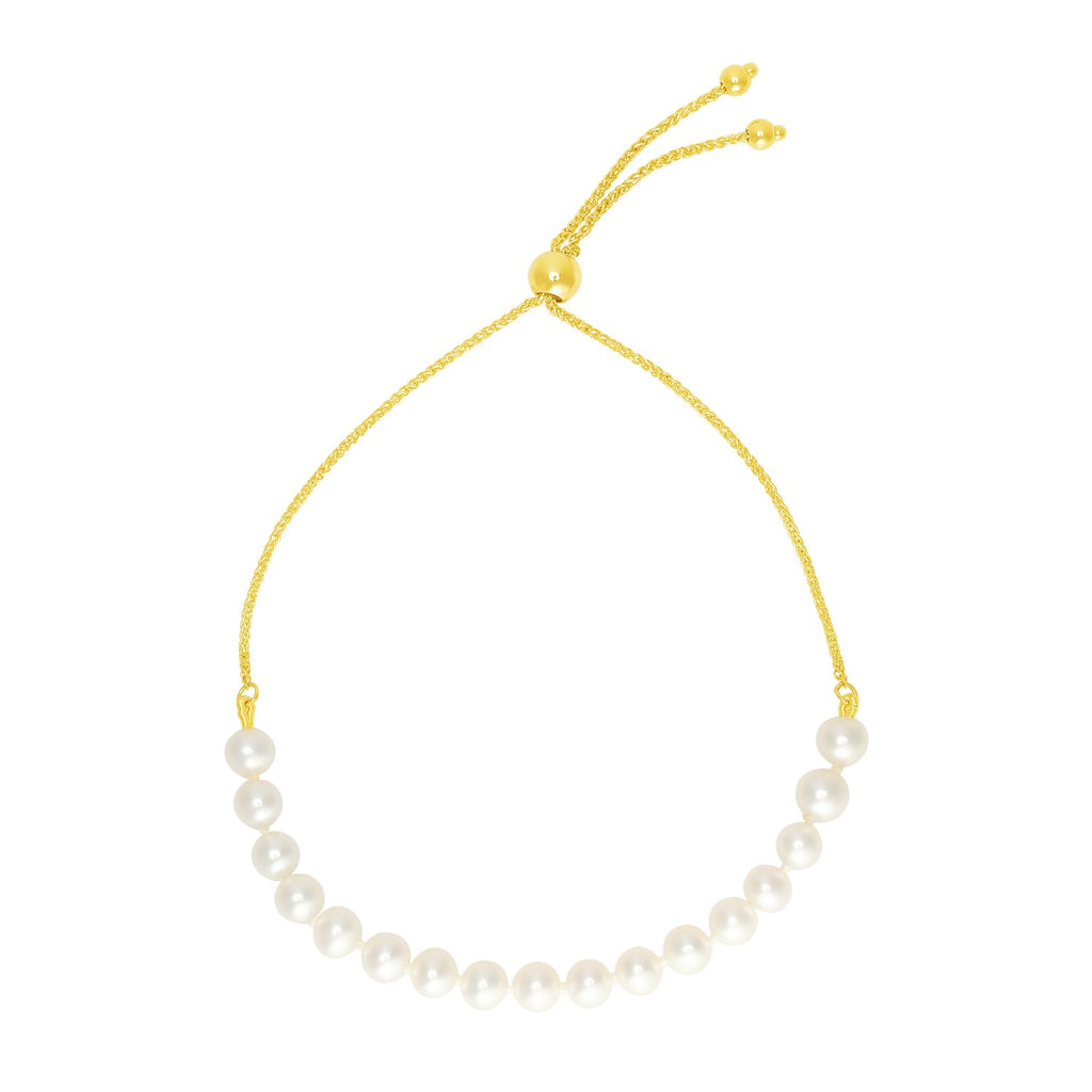14k yellow gold adjustable friendship bracelet adorned with elegant round pearls for a modern, luxurious touch.