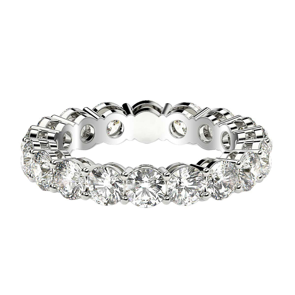 Round cut lab-grown diamond eternity ring in 14k white gold, featuring a modern prong setting and exquisite sparkle.