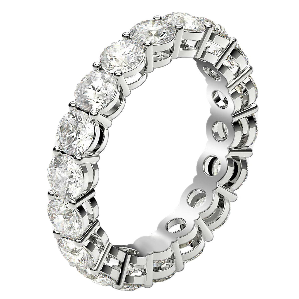 Round cut lab-grown diamond eternity ring in 14k white gold, featuring a modern prong setting and exquisite sparkle.