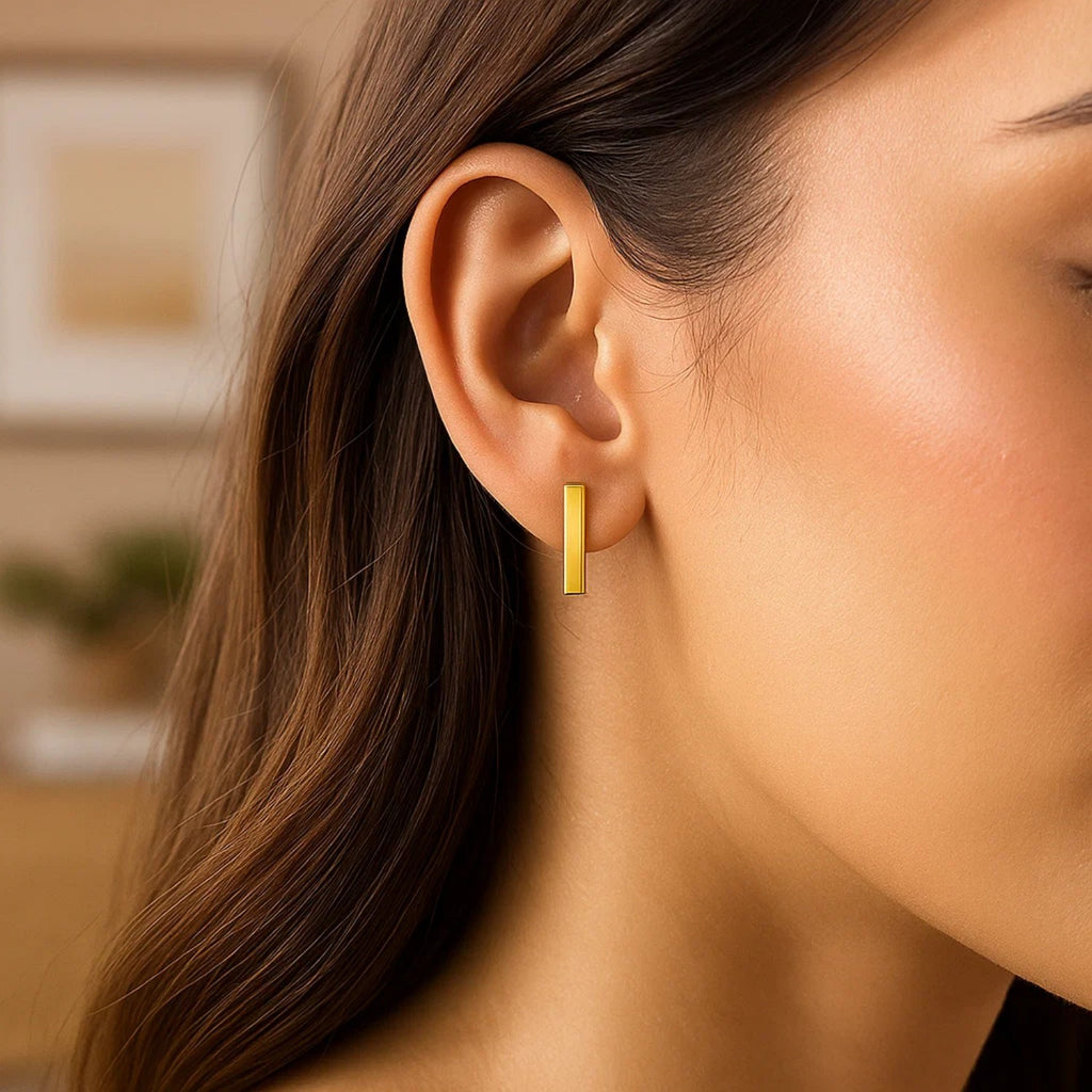 14k yellow gold modern bar post earrings showcasing sleek design and luxurious elegance for sophisticated style.