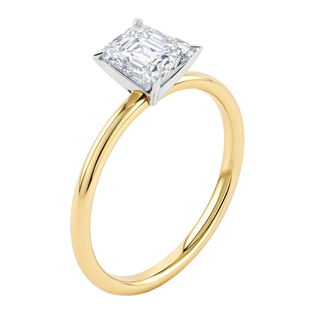 2 carat emerald lab-grown diamond solitaire ring in 10K yellow gold with elegant prong setting and modern design.
