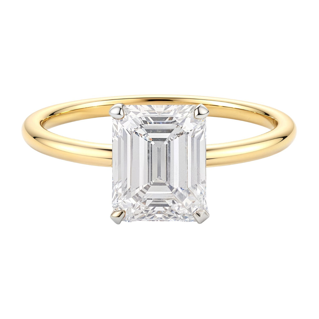 2 carat emerald lab-grown diamond solitaire ring in 10K yellow gold, featuring a modern prong setting.