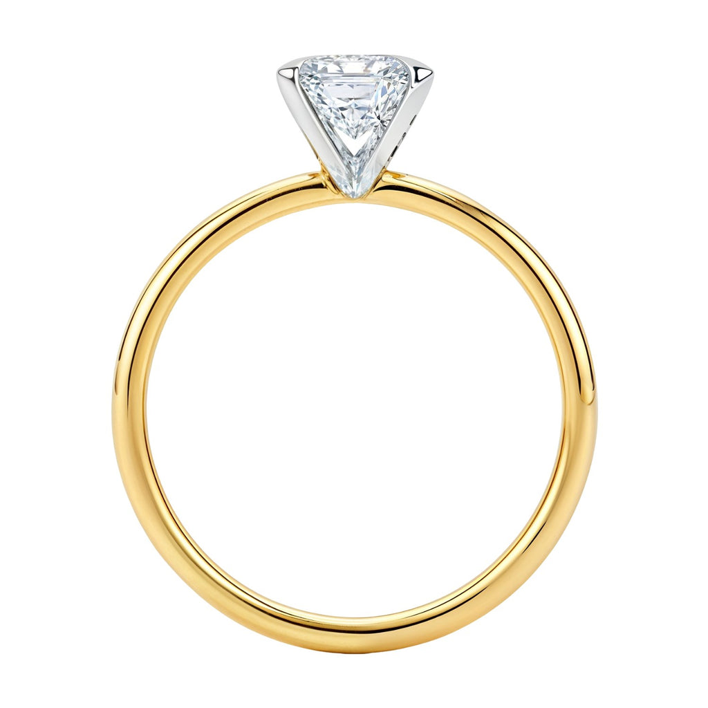 2 carat emerald lab-grown diamond solitaire ring in 10K yellow gold, featuring a modern prong setting.