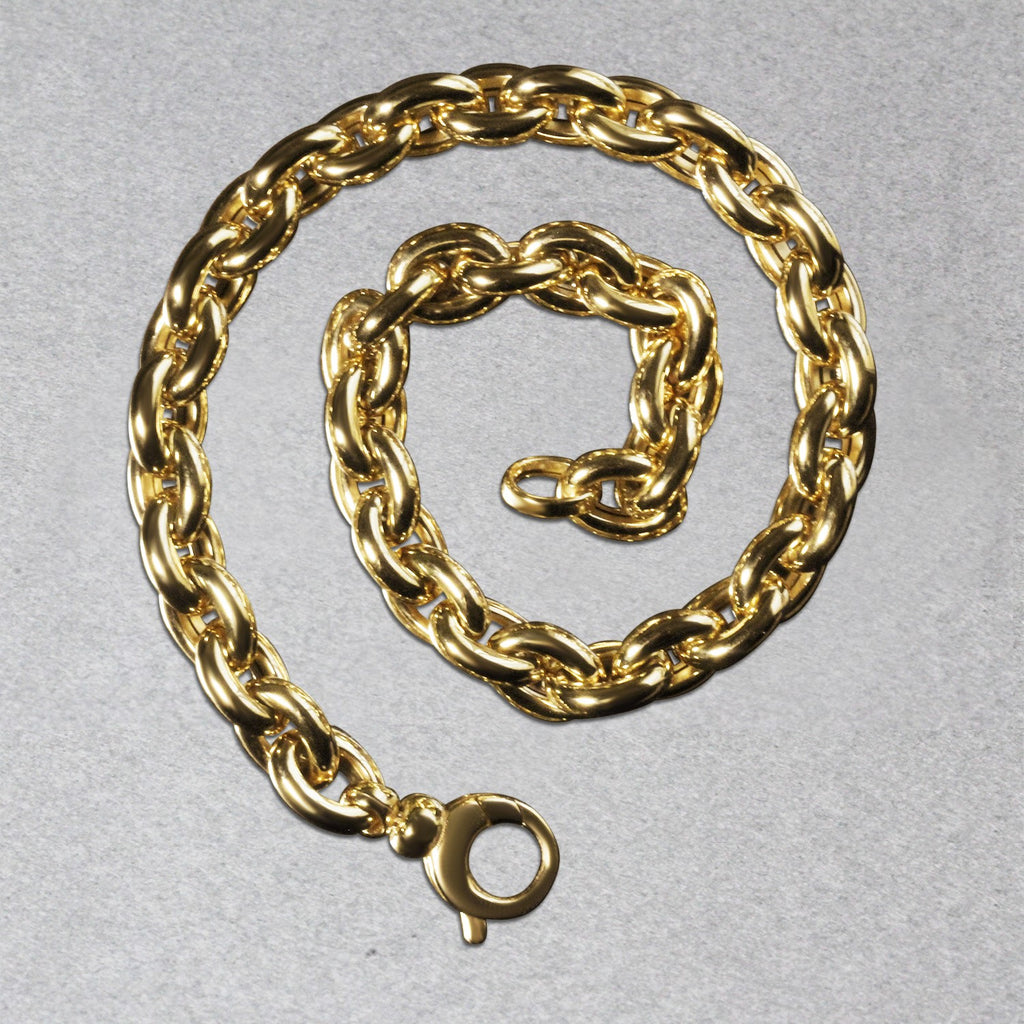 14k yellow gold polished oval link bracelet featuring elegant stud design, perfect for sophisticated style.
