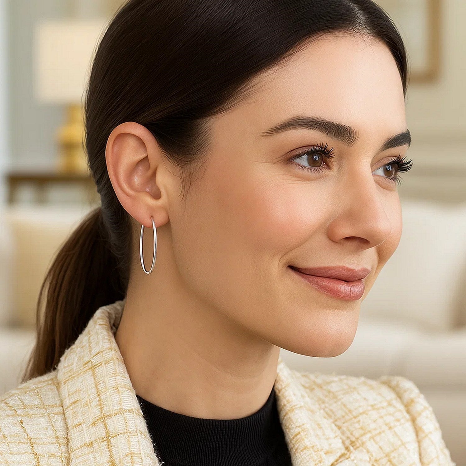 14k white gold polished hoop earrings with a sleek modern design, perfect for elegant everyday wear.