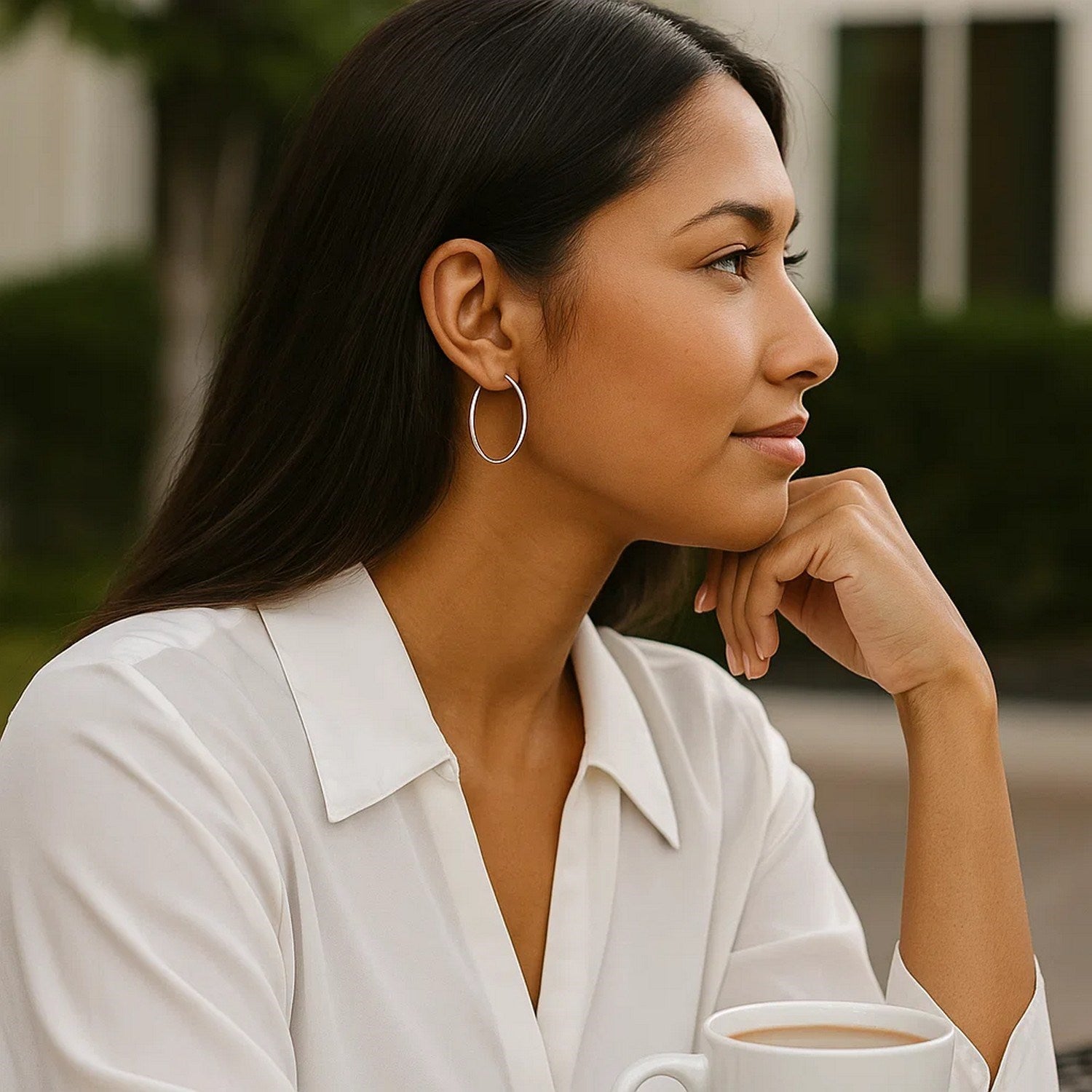 10k white gold polished hoop earrings crafted in 14k gold, showcasing a sleek modern design for elegant wear.