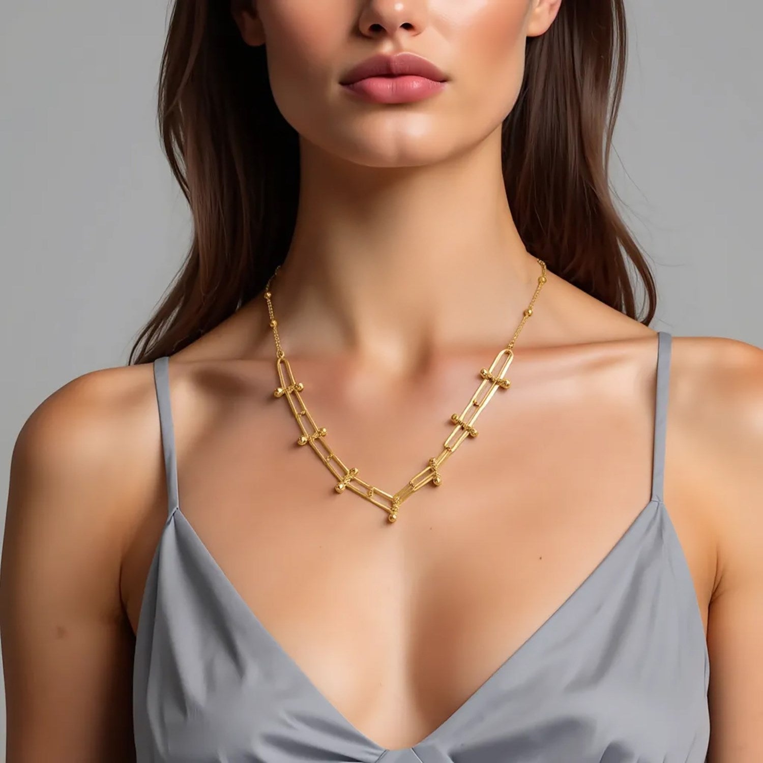 14k yellow gold beaded U link chain necklace showcasing minimalist elegance and refined craftsmanship.
