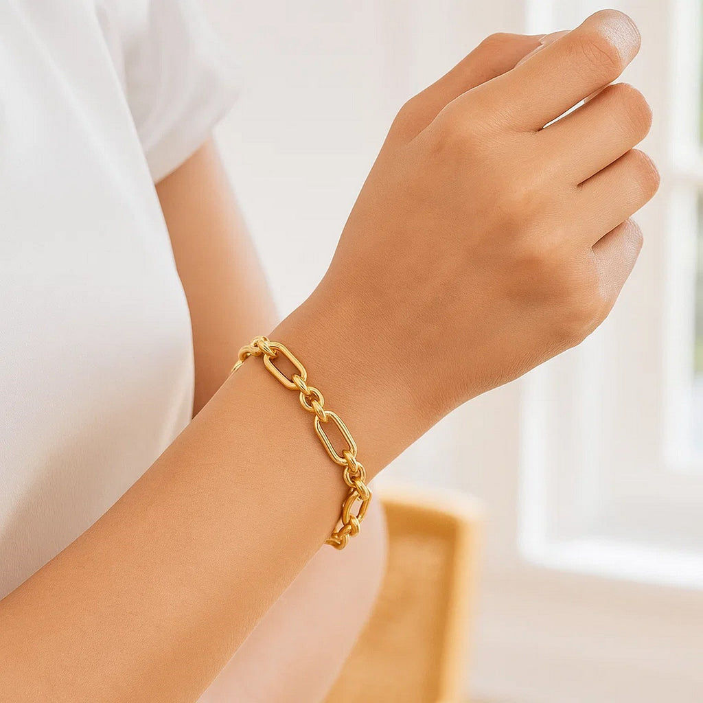 14k yellow gold modern bracelet featuring alternating paperclip and round links, showcasing Italian craftsmanship.