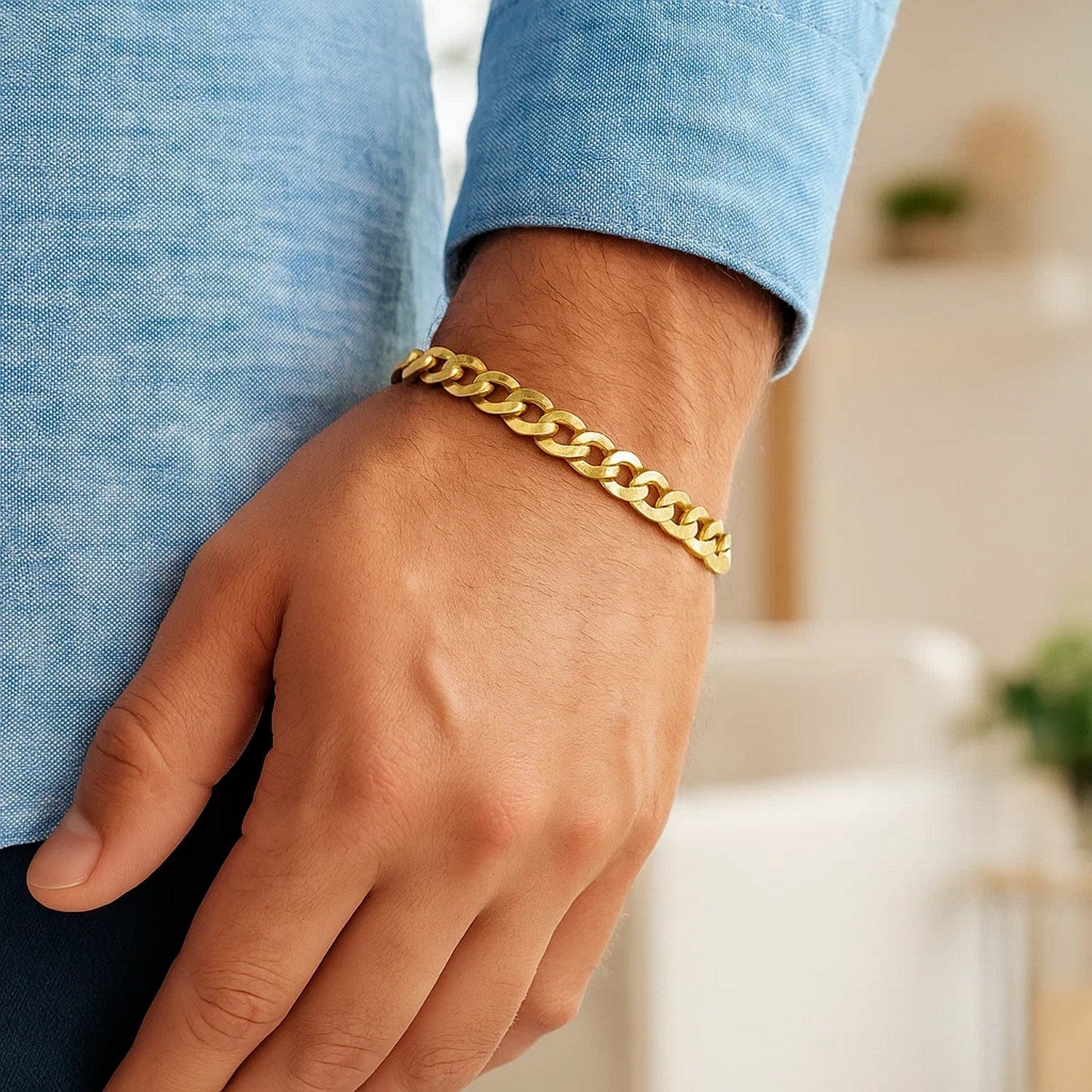 14k yellow gold curb bracelet featuring a contemporary chain link design, perfect for elegant layering.