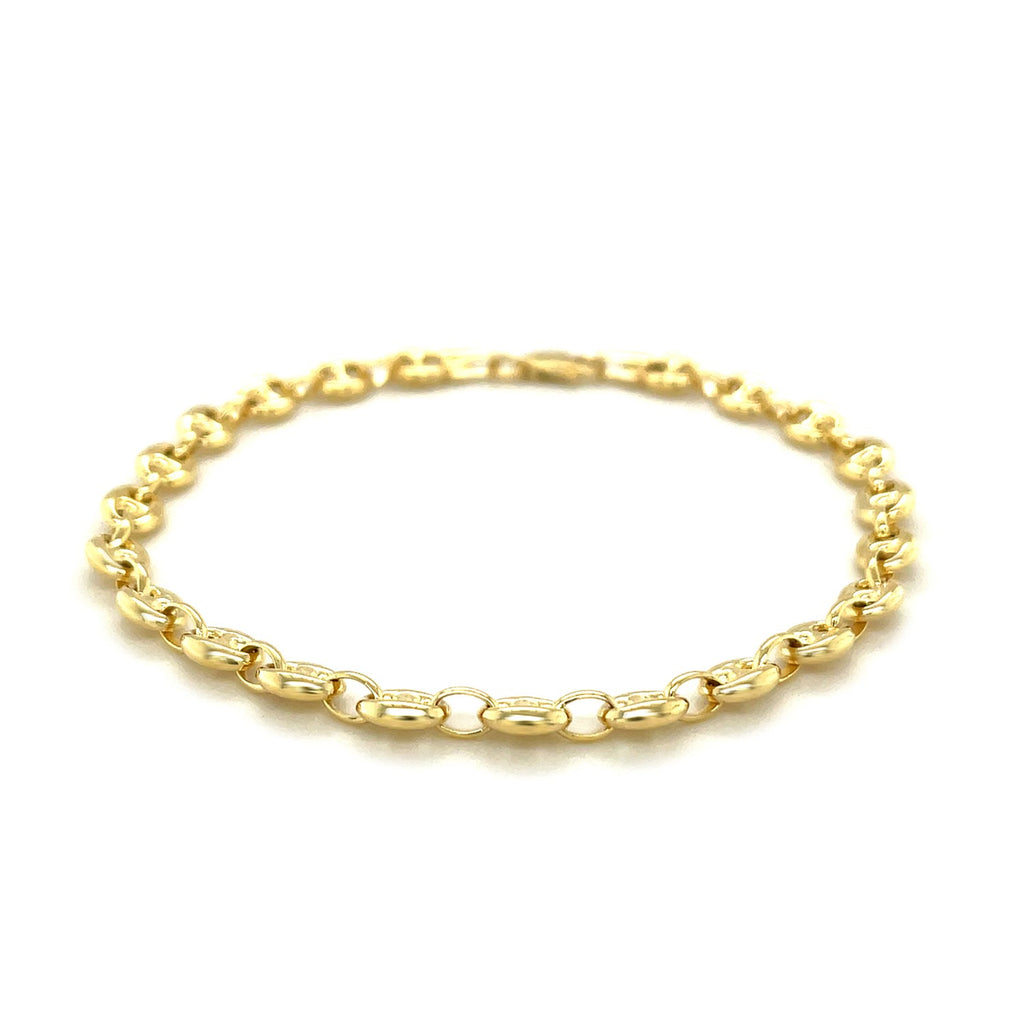 Elegant 14k yellow gold puffed mariner anklet featuring a refined chain link design for a luxurious touch.