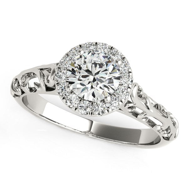 14k white gold halo engagement ring featuring a round diamond, exuding timeless elegance and contemporary charm.