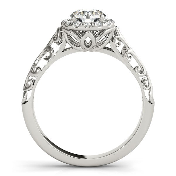 14k white gold halo engagement ring featuring a round diamond, showcasing antique style elegance and contemporary design.