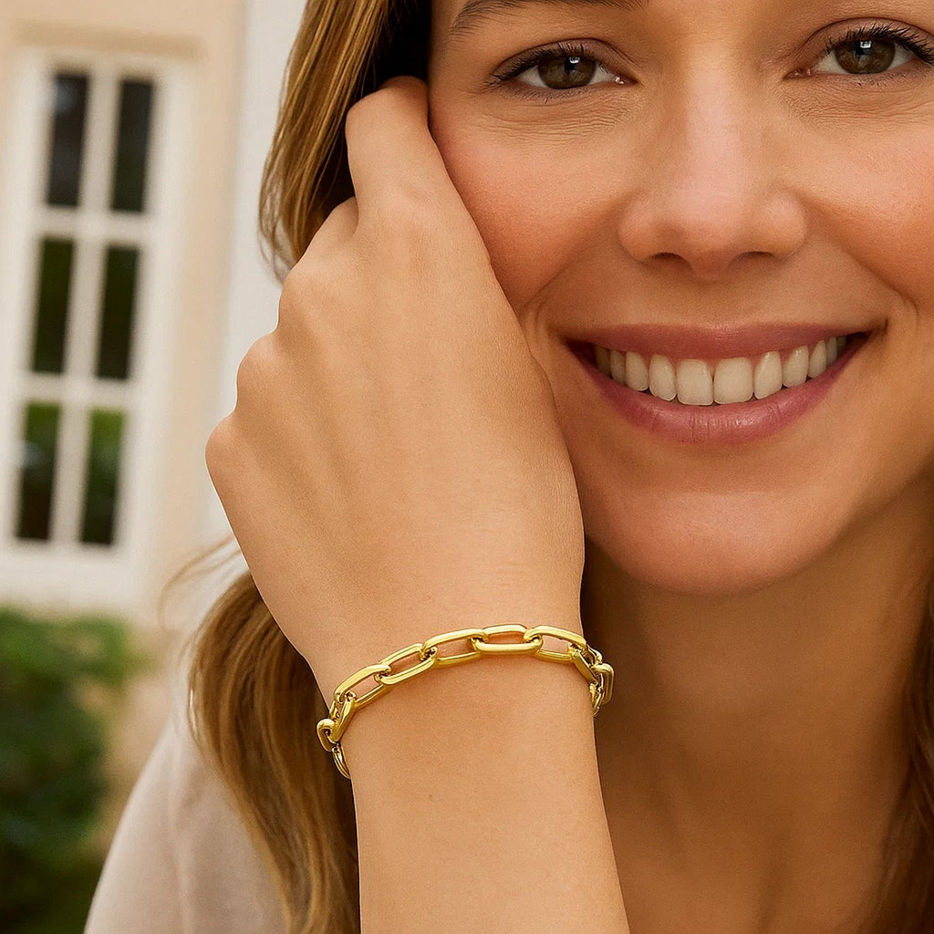 Elegant 14k yellow gold French cable link bracelet featuring round links, perfect for sophisticated styling.