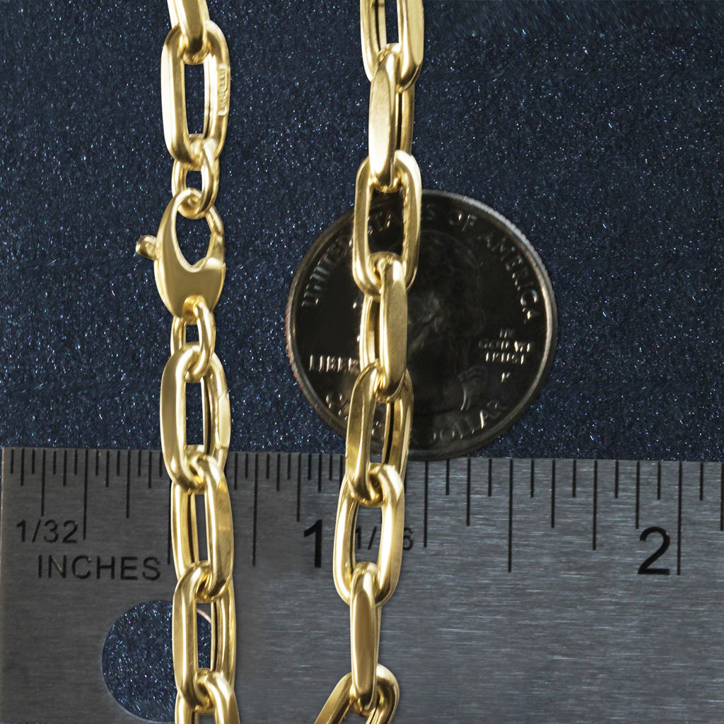 Elegant 14k yellow gold French cable link bracelet featuring round links, perfect for a luxurious touch.