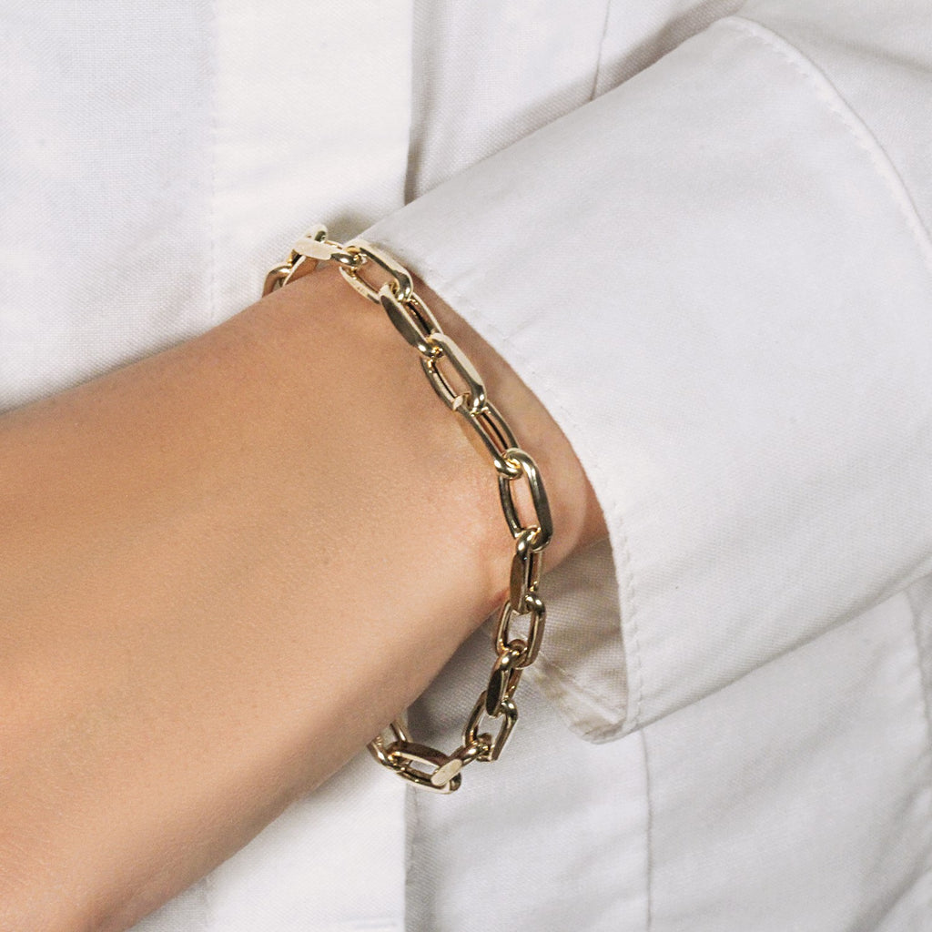 Elegant 14k yellow gold French cable link bracelet, 6.00 mm, showcasing refined round links for a timeless look.