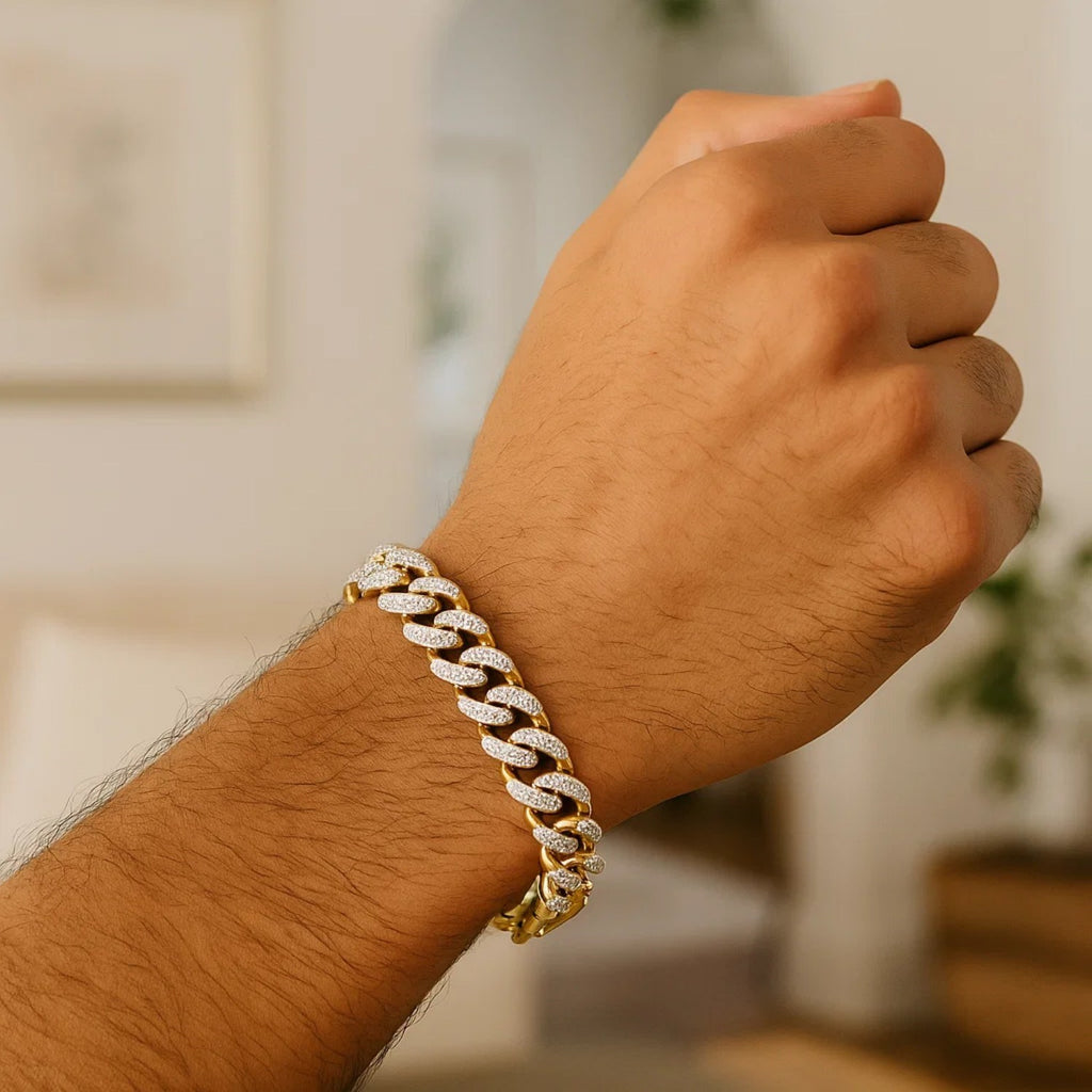 14k two-tone gold curb chain bracelet with white pave accents, showcasing contemporary elegance and luxurious design.
