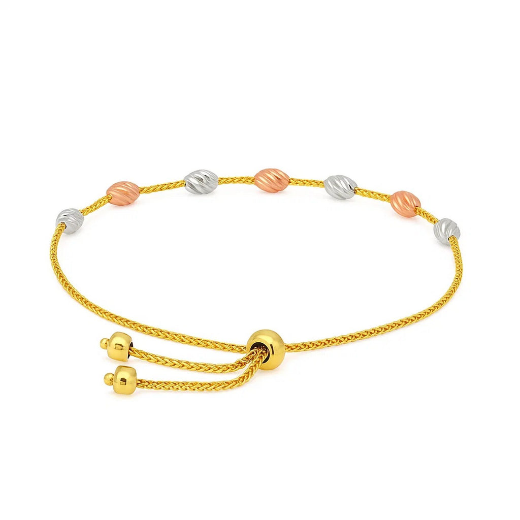 14k tri-color gold textured oval station lariat bracelet featuring elegant links and sparkling diamond accents