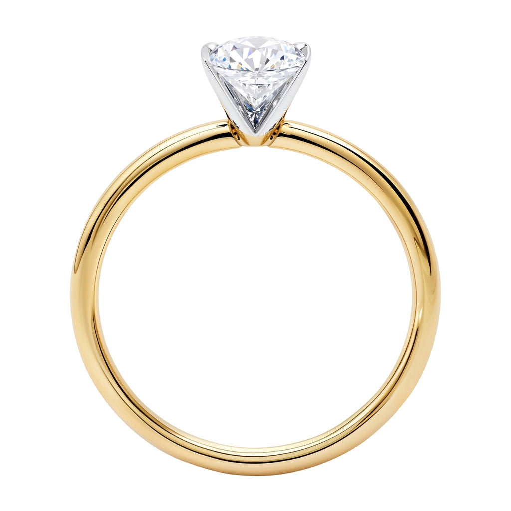 1 1/2 carat oval lab-grown diamond solitaire ring in elegant 10K yellow gold, showcasing timeless luxury and sophistication.