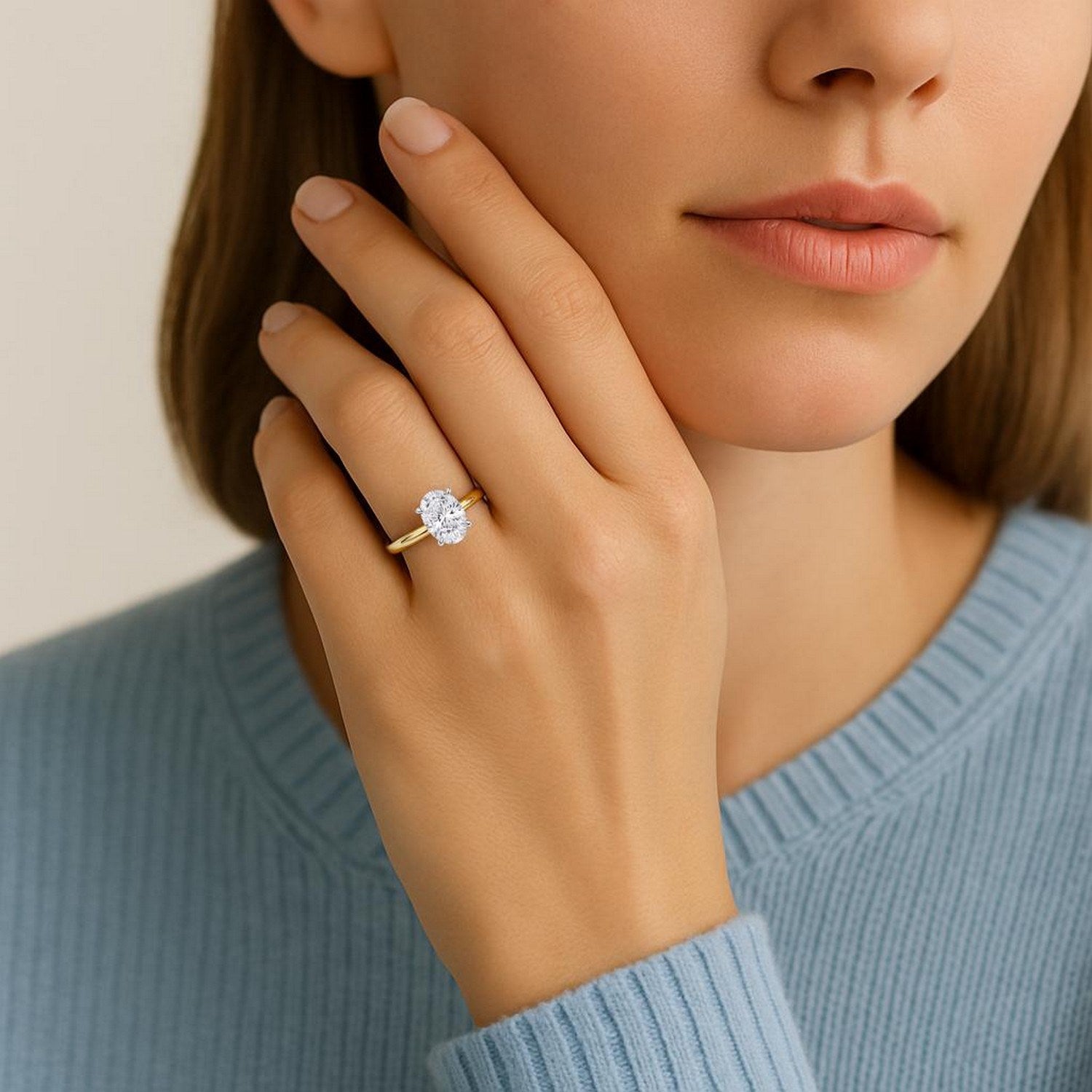 1 1/2 carat oval lab-grown diamond solitaire ring in elegant 10K yellow gold, showcasing timeless luxury and sophistication.