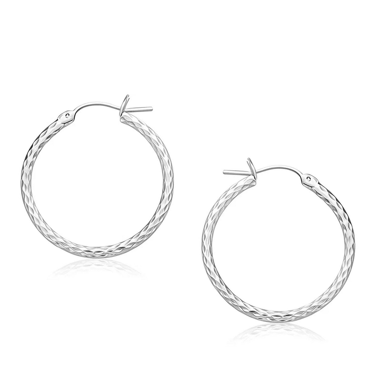 14k white gold diamond cut hoop earrings featuring a modern design, perfect for elegant occasions and everyday wear.