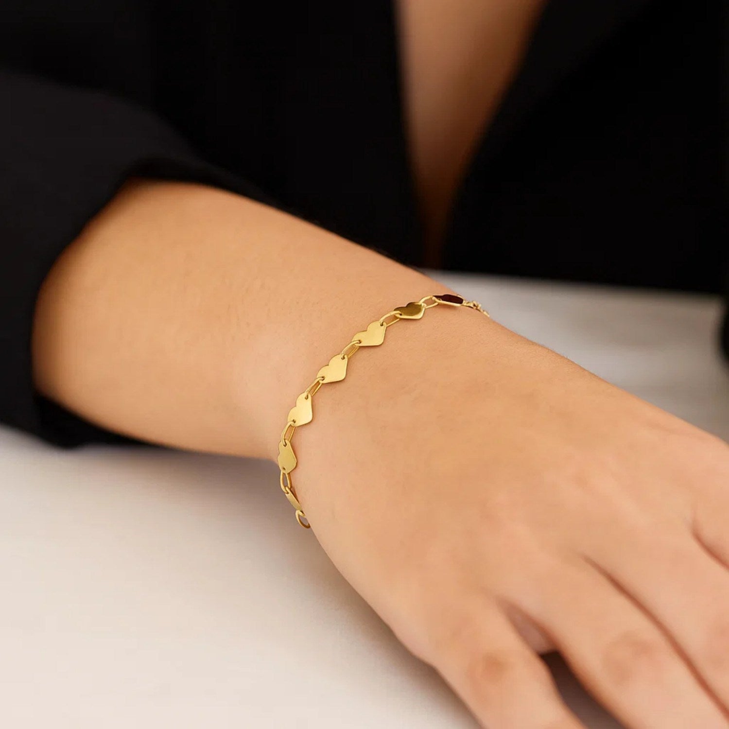 Elegant 10K yellow gold chain bracelet featuring a mirror heart design, perfect for luxury jewelry lovers.