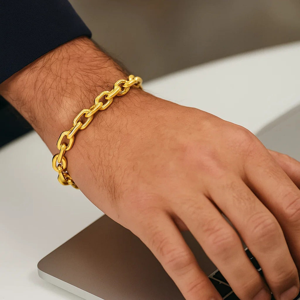 Elegant 14k yellow gold French cable chain bracelet featuring a refined round design, perfect for luxurious layering.