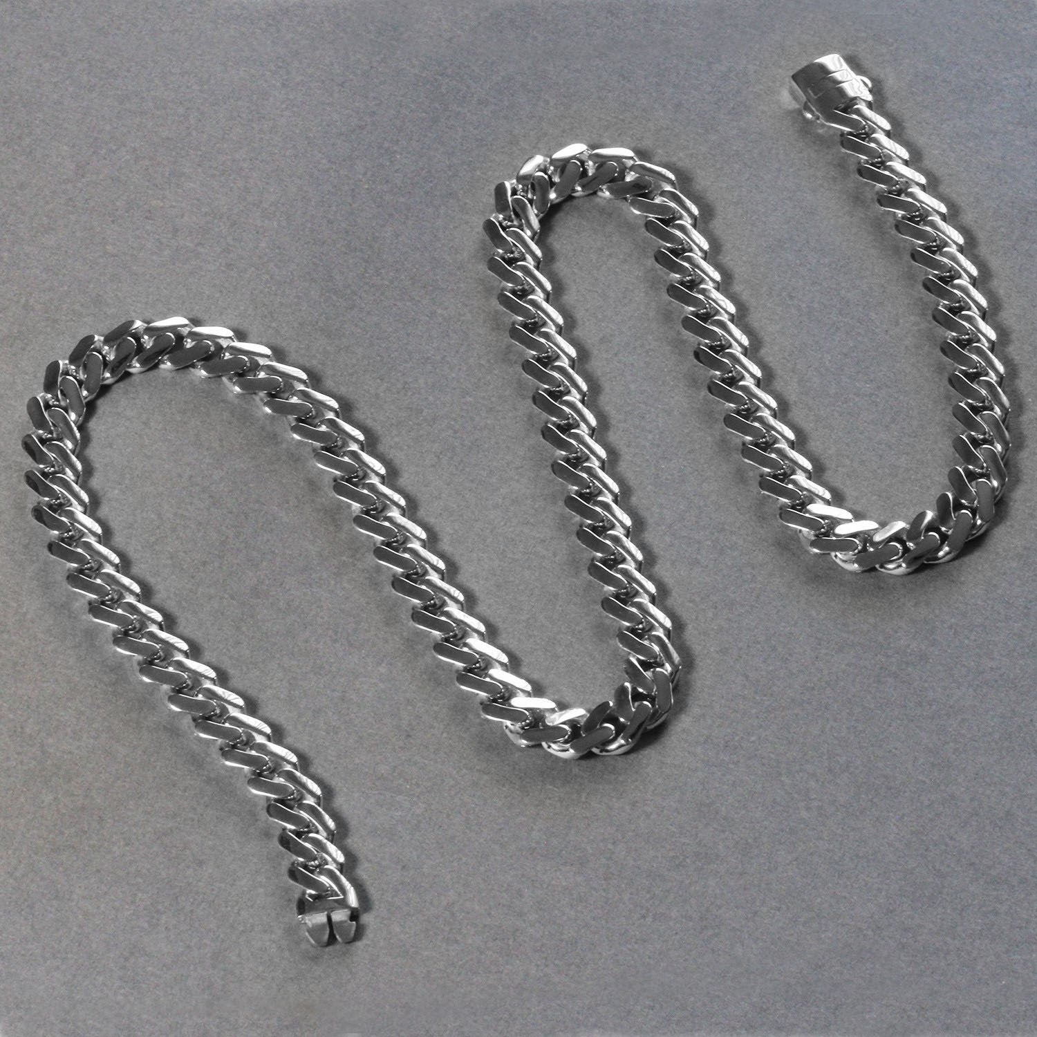 Polished 14k white gold curb chain necklace, 22 inches, showcasing modern elegance and refined craftsmanship.