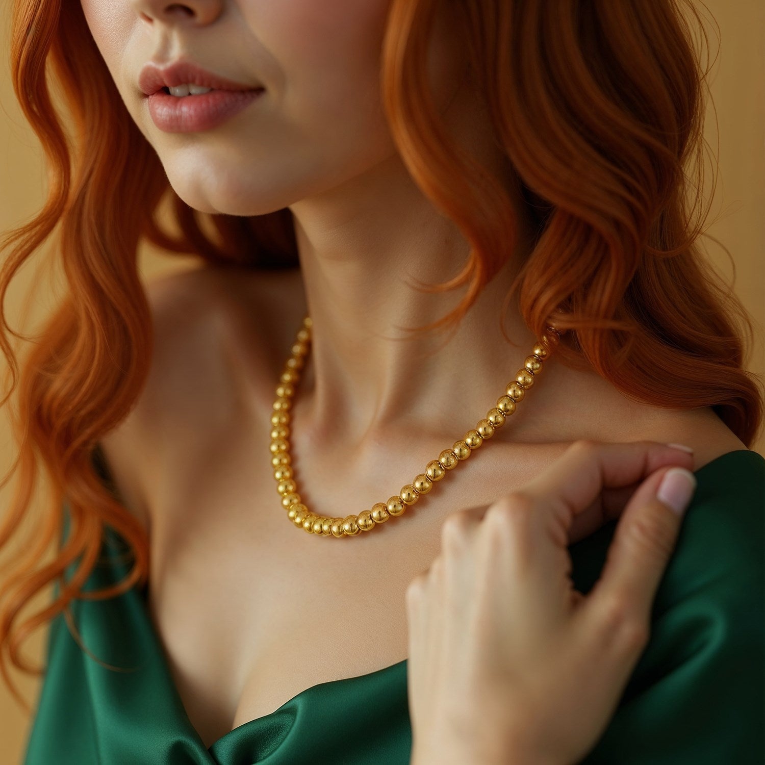 Elegant 14k yellow gold bead chain necklace featuring 4mm round beads, perfect for layering or wearing solo.