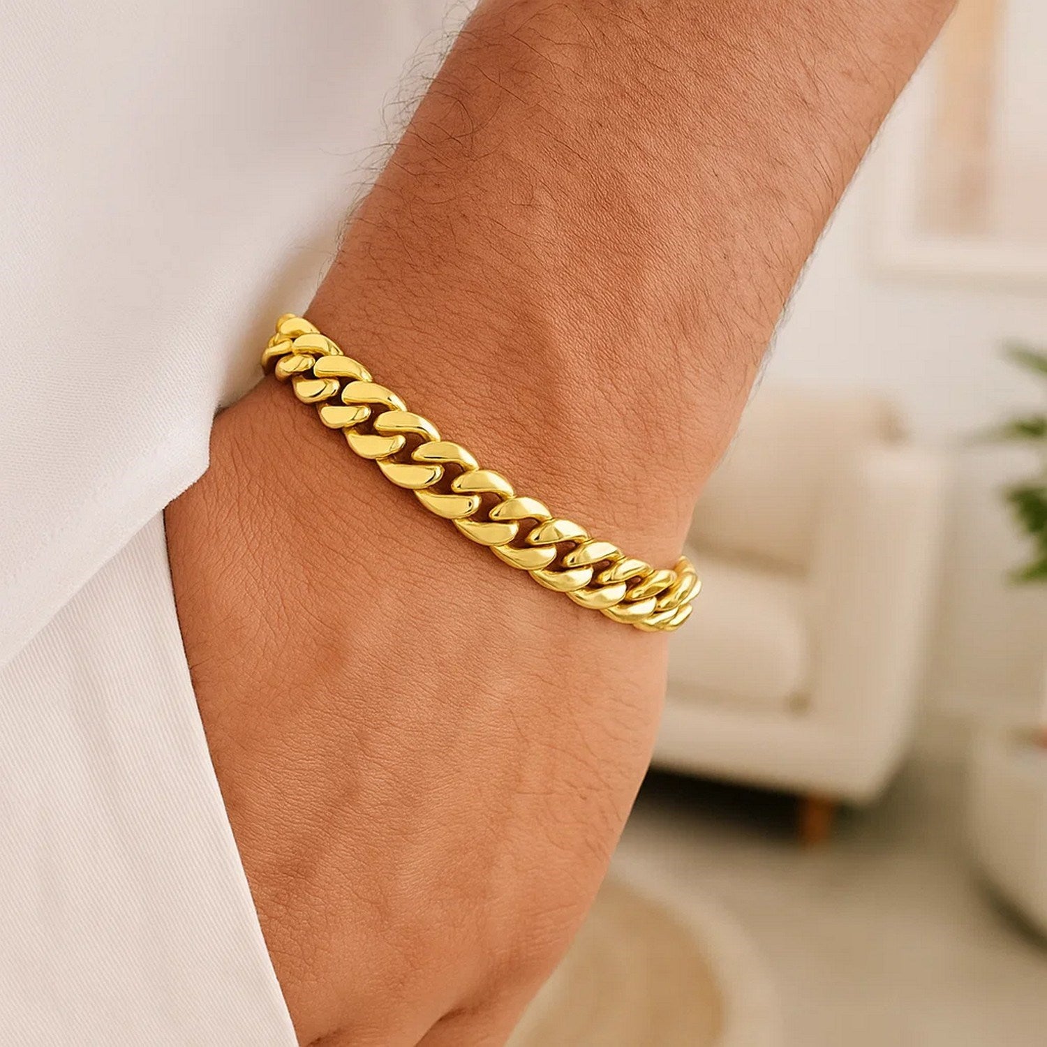 14k yellow gold Miami Cuban bracelet with modern round links, showcasing timeless elegance and luxury craftsmanship.