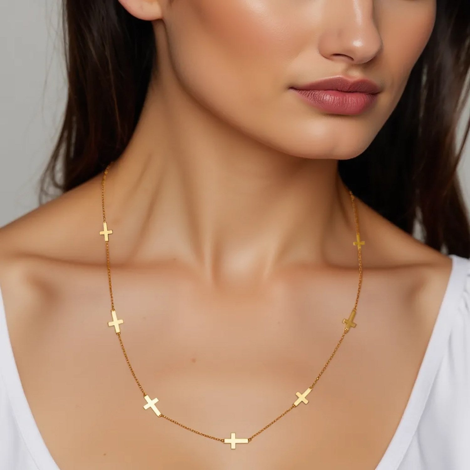 14k yellow gold chain necklace featuring elegant cross stations for a timeless, luxurious look.