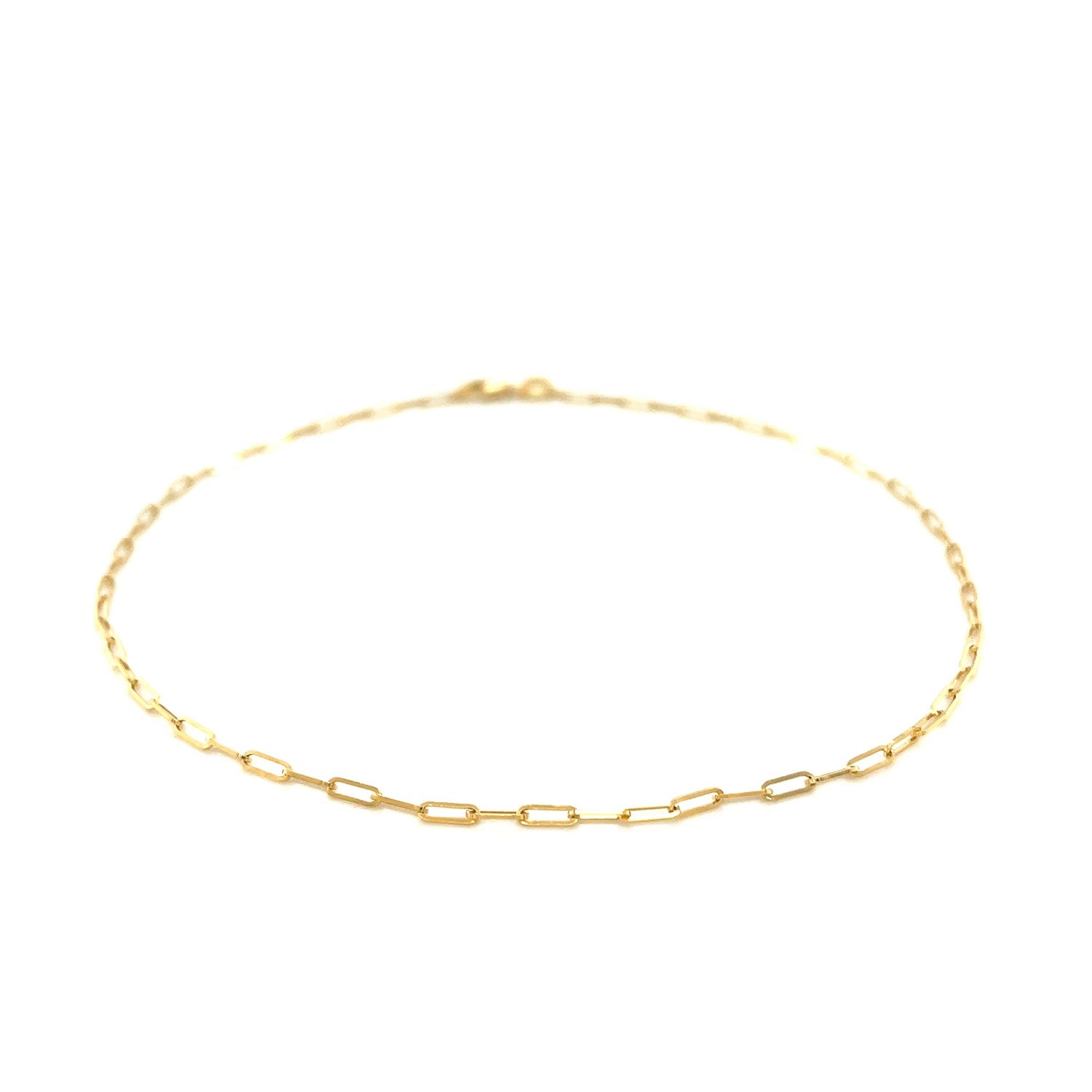 Elegant 14k yellow gold fine paperclip anklet featuring a delicate chain design, perfect for layering or solo wear.