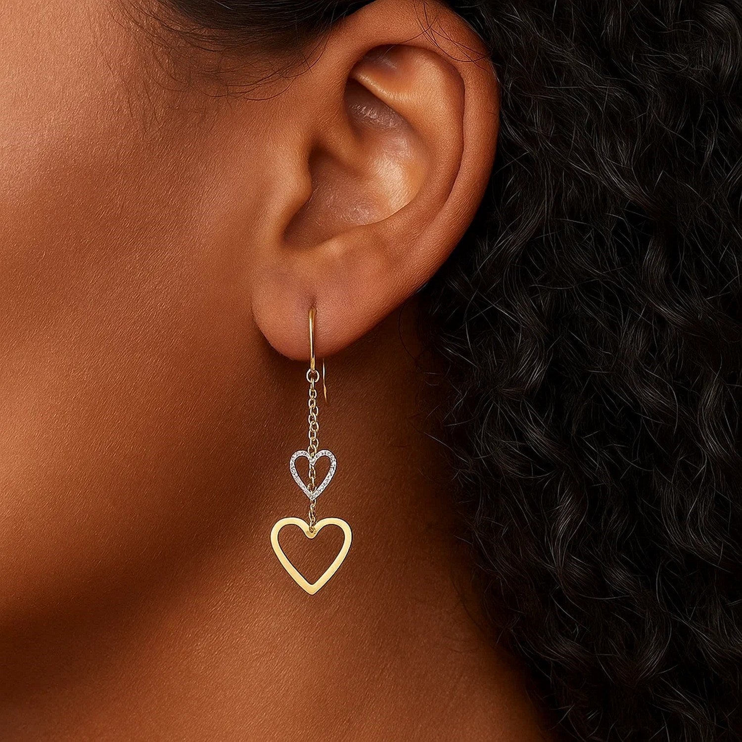 14k two-tone gold dangle heart earrings featuring an elegant design and luxurious round shape for a refined look.