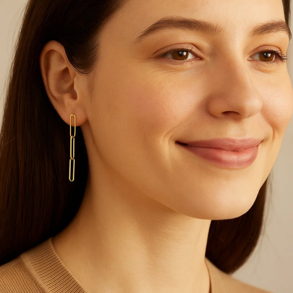 14k yellow gold modern dangle earrings featuring a sleek paperclip chain design for a chic, elegant look.