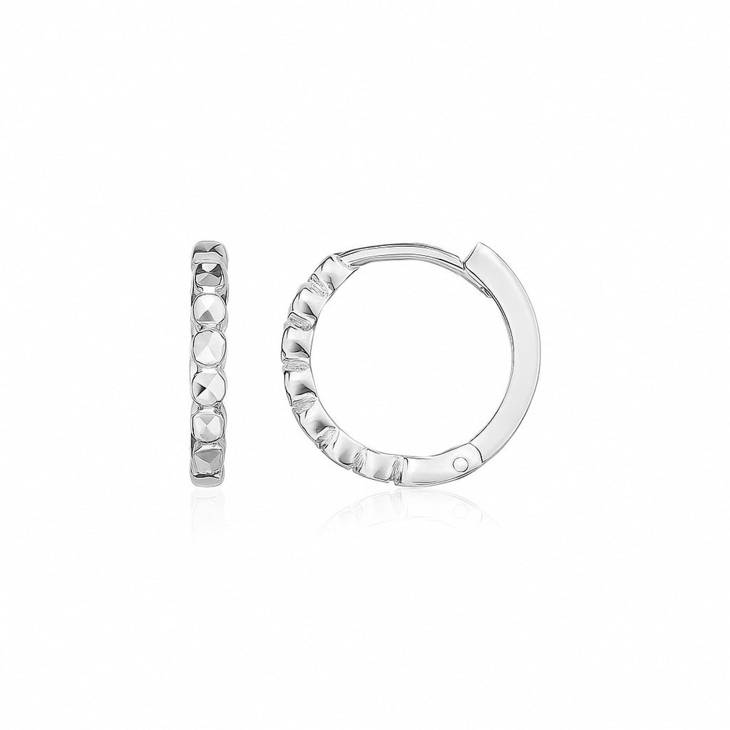 14k white gold contemporary textured round hoop earrings, a luxurious addition to any jewelry collection.