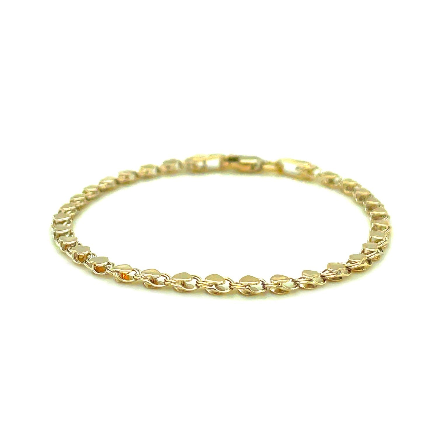 Elegant 2.9mm 14k yellow gold heart anklet featuring a delicate chain design for a luxurious touch.