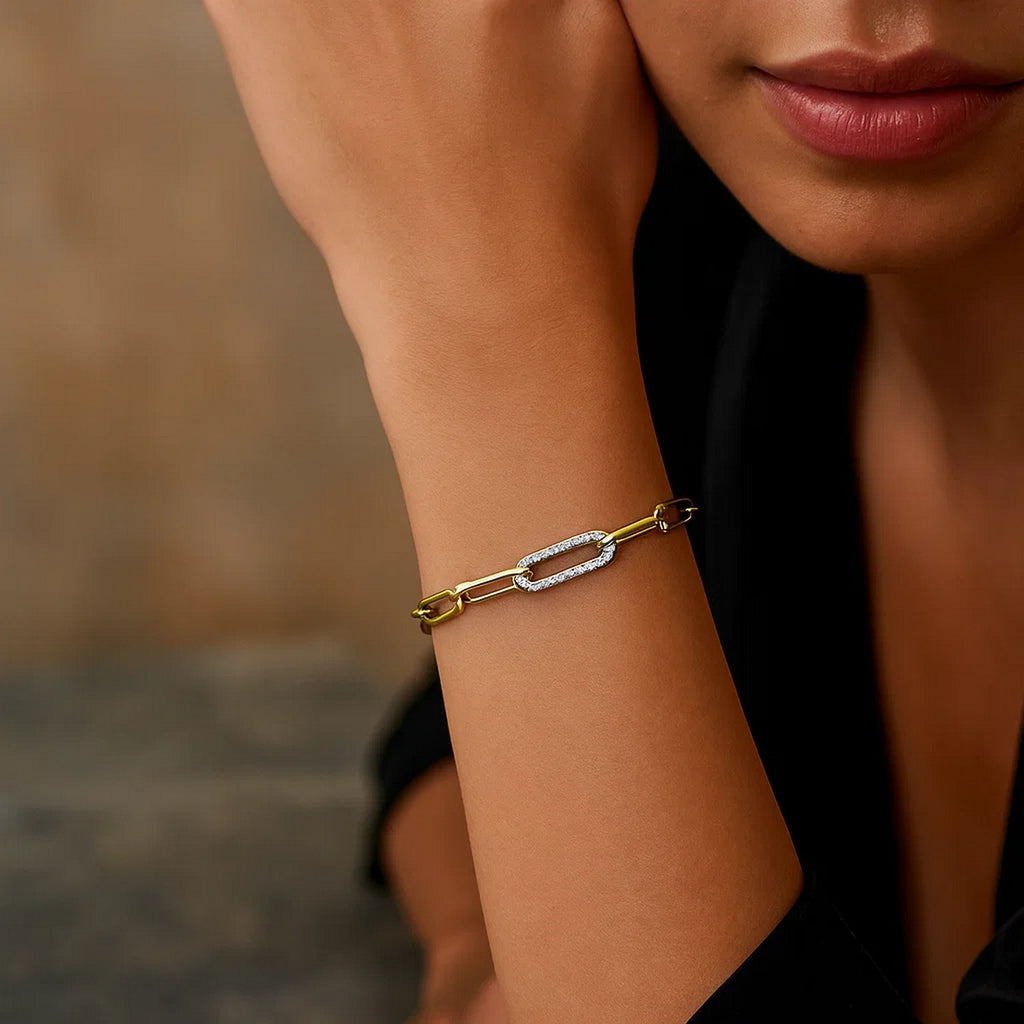 14k yellow gold paperclip chain bracelet featuring a modern diamond link design, perfect for elegant layering.