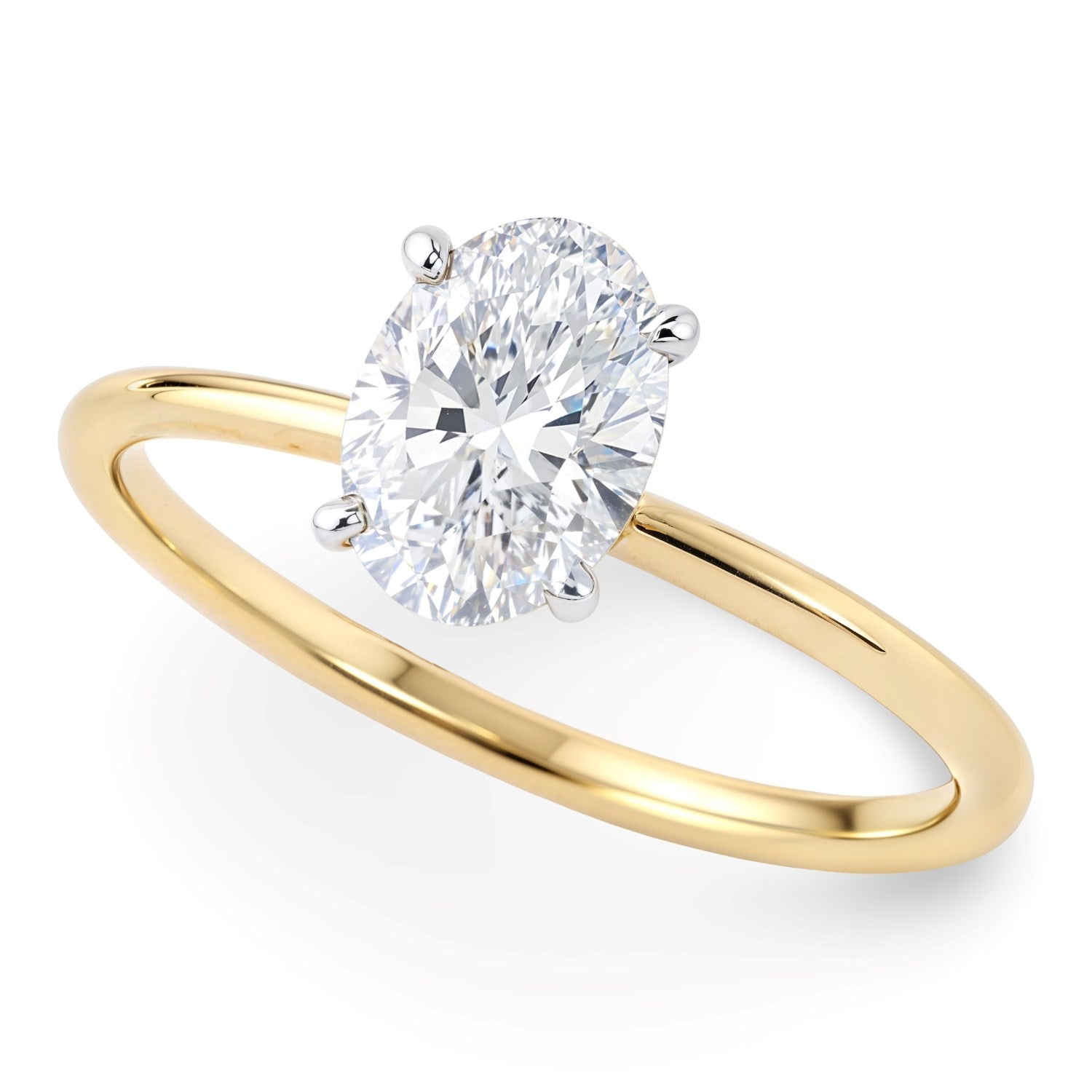 1 Carat oval lab-grown diamond solitaire ring in 10K yellow gold, showcasing modern elegance and timeless beauty.