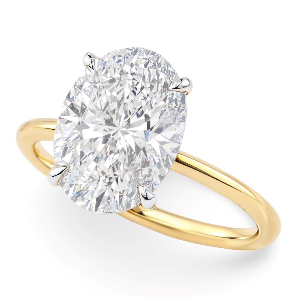 5 carat oval lab-grown diamond solitaire ring in elegant 10K yellow gold setting, showcasing timeless luxury and sophistic...